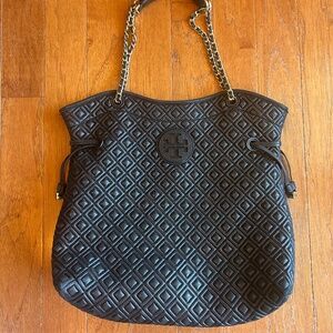 Tory Burch Fleming Soft Tote in black quilted leather.